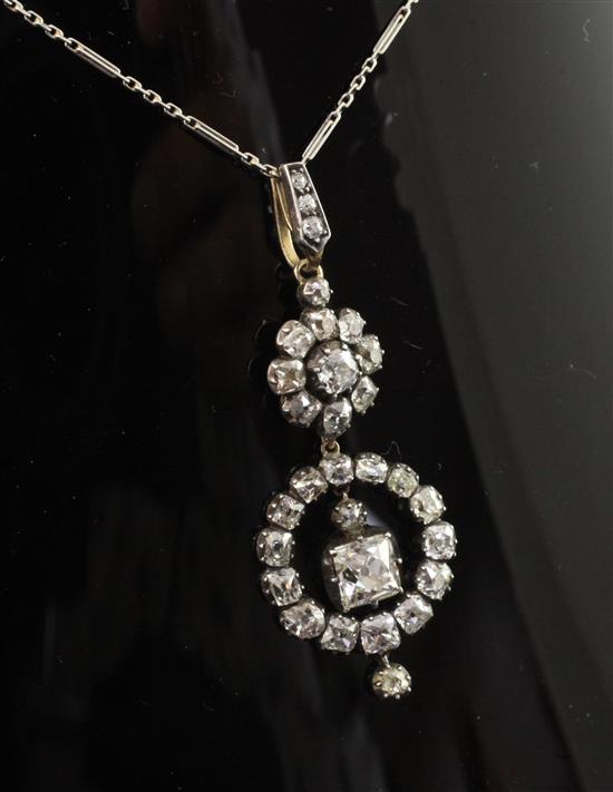 A 19th century gold, silver and diamond cluster drop pendant, pendant 2in.